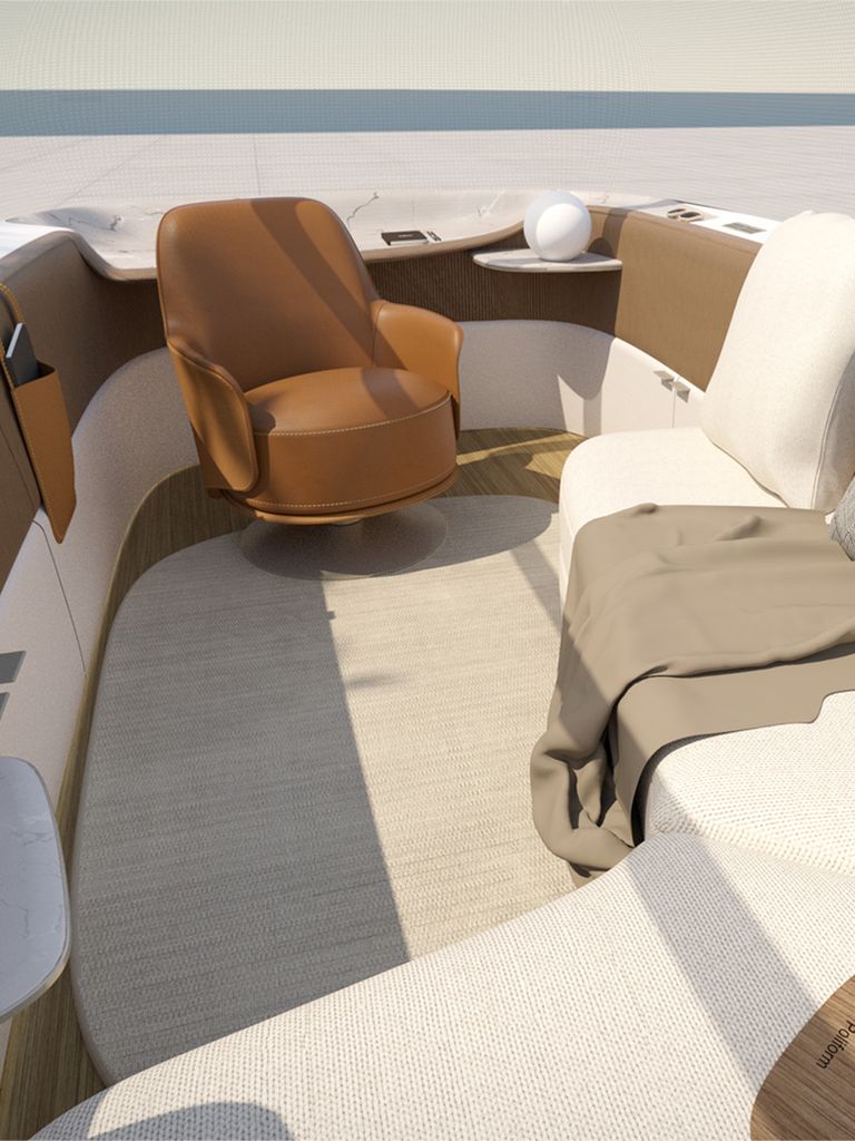 Poliform's interior design for the Audi urbansphere concept shows a cozy in-terior with lots of cushions and an armchair.