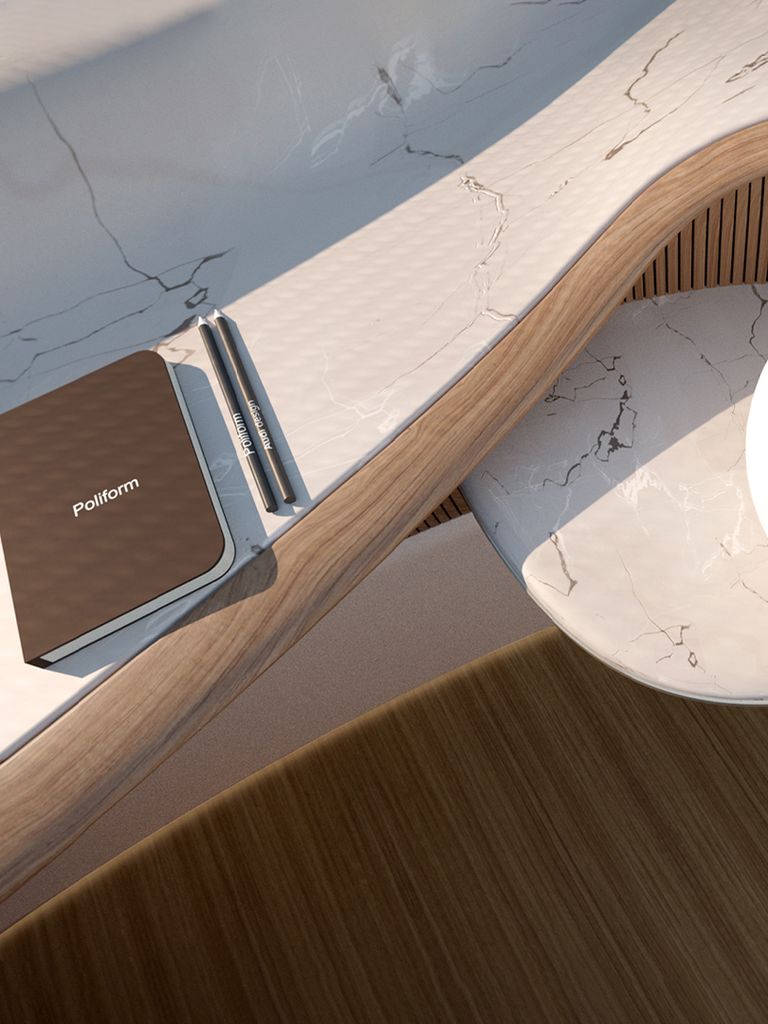 On a table in Poliform's interior design for the Audi ur-bansphere concept lies a notepad with a pen and a round lamp.
